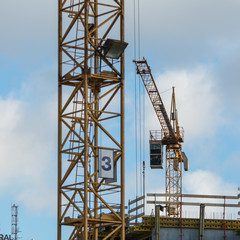 Fototapeta na wymiar Crane construction development of the city and new investment