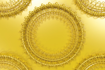 Pattern of concentric shapes made of rings and spirals on yellow background