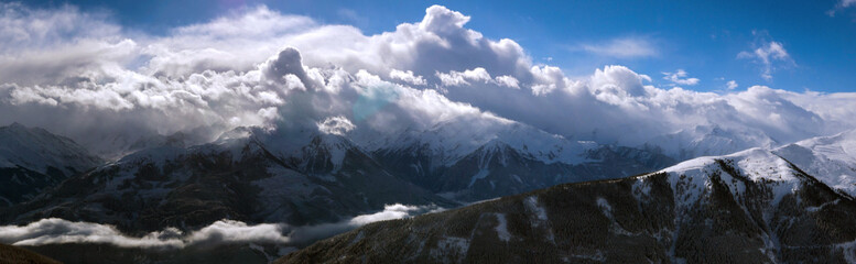 Panorama of the Austrian Alps at sunny winter day