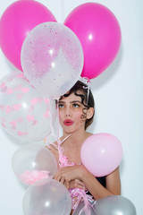 Pretty girl with party balloons