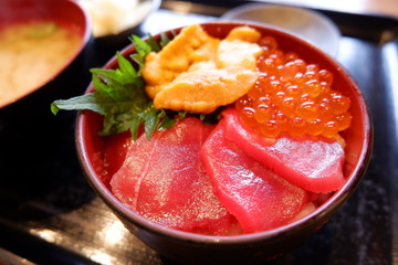 Fresh Tuna slide with bowl rice on the table