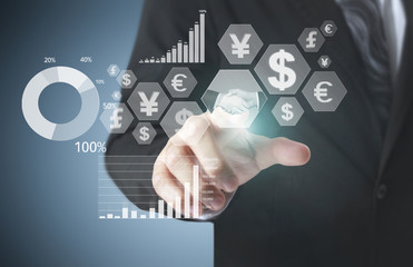Fototapeta premium financial symbols coming from hand