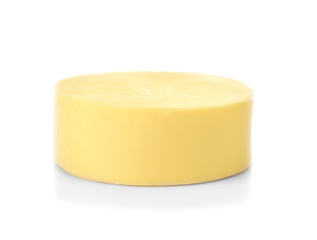 Piece of fresh cheese on white background