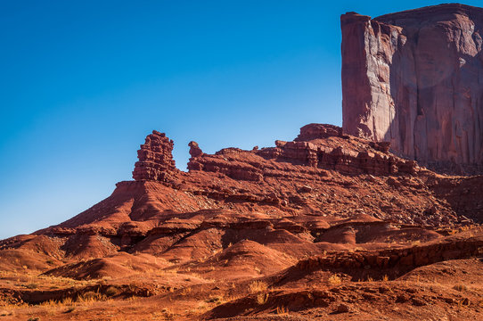 Unique natural monuments created by erosion in Monument Valley.