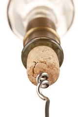 pulling corkscrew cork from the bottle