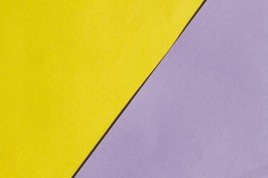 Bright yellow and purple paper texture background diagonal location