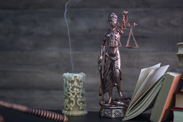Law and Juystice theme, mallet of the judge, justice scale, hourglass, books, wooden rustic desk