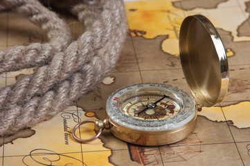 compass and rope on map