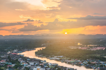 Fototapeta na wymiar Beautiful sunset over the estuary community view from Mut Sea mountain, Chumphon, Thailand