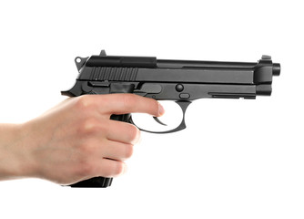 Man's hand holding gun on white background