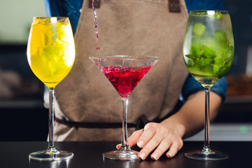 Barman preparing cocktails