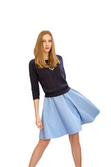 beautiful young blonde girl in blue dress and blouse