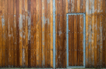 old solid wooden walled gate and door background