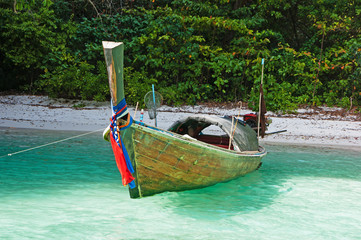 Traditional longtail boats in the famous Maya bay of Phi-phi Leh island