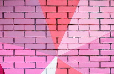 Colorful (pink, purple, coral and white) painted brick wall as background, texture