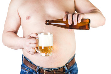 A man with a big belly, pouring a glass of beer.