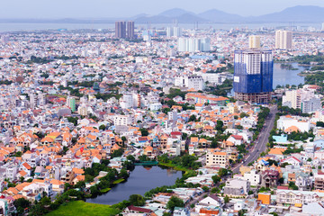 Fototapeta premium Vung Tau, Vietnam - January 18, 2017: Birds eye view of Vung Tau city from statue of Jesus on Tao Phung mountain, Vung Tau beach city, SoundVietnam.