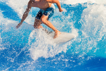 Surfer riding the waves