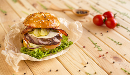 Big burger with meat and bacon