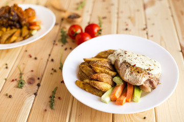 Baked potatoes with turkey. Some tasty and useful vegetables
