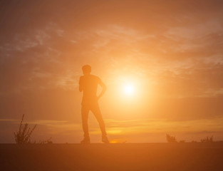 Man show hands silhouette sunset background  