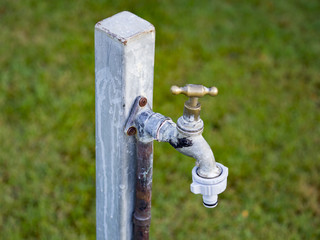 Old garden tap turned off.