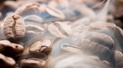 Coffee beans roasting with smoke,Selective focus