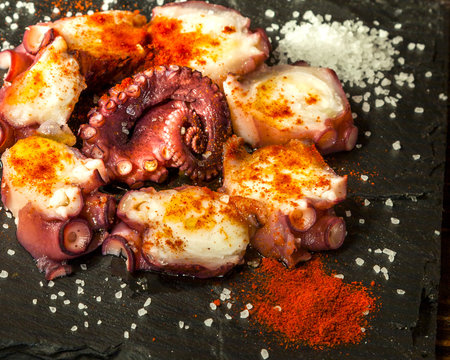 Spanish tapas Pulpo a la Gallega,typical spanish octopus with olive oil and paprika