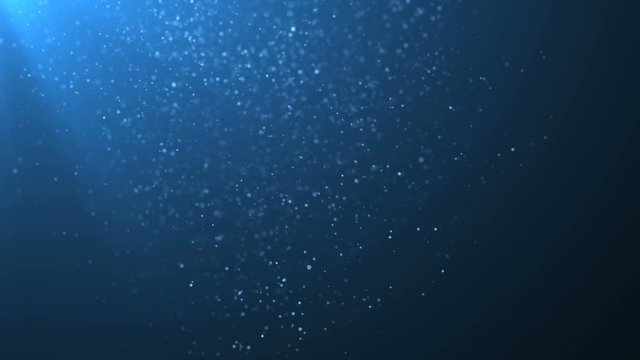 Abstract blue background with bright bokeh, circles, glitter. Plankton in the sea