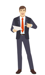Businessman pointing at a paper in his hand