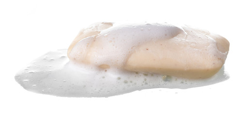 Soap with foam isolated on white