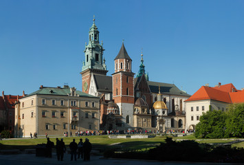 Fototapeta na wymiar The Wawel Royal Castle in Krakow, Poland. The courtyard of the architectural complex includes the Cathedral of Saints Stanislaus and Vaclav.