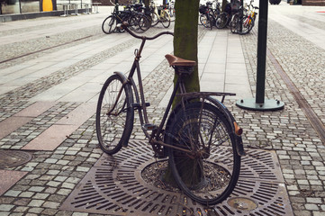 Old bicycle on the street.
