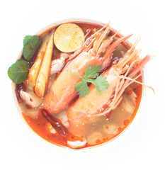 Closeup Tom Yum Goong Spicy Sour Soup isolated on white background, Thai food