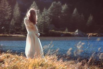 Romantic woman and sunset light