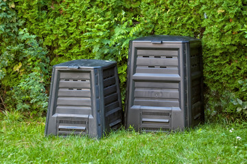 Compost silos in the backyard. Two different sizes