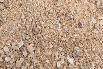 Road sand and salt mixture used for winter road safety.