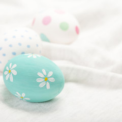 Easter eggs on white background  with copyspace. Happy Easter!.