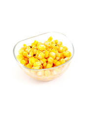 Boiled corn seeds on white background