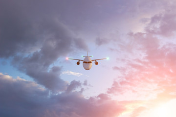 Airplane  plane  in beautiful  sky at sunset