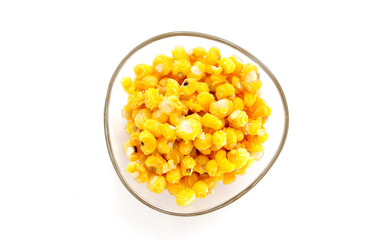 Boiled corn seeds on white background