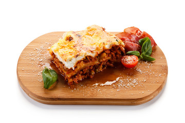 Lasagna on cutting board