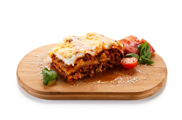 Lasagna on cutting board