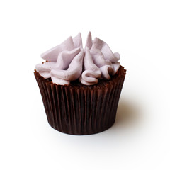 chocolate cupcake with cream on white background