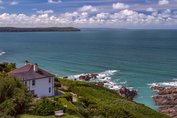 Fototapeta na wymiar House on the beach in a picturesque place. North Devon Coast. England