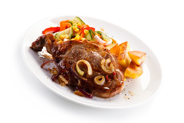 Roast steak with baked potatoes