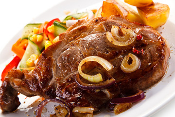 Roast steak with baked potatoes