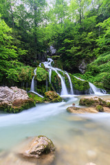 Beautiful scenic summer landscape of Kurdzhips river waterfall in Caucasus mountain forest, Russia