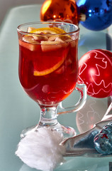 Hot mulled wine in a glass cup