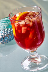Hot mulled wine in a glass cup